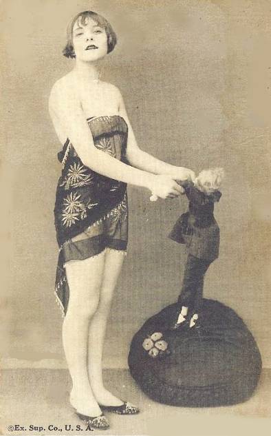 1920 ca postcard-chicago-exhibit-supply-company-arcade-card-pin-up-woman-in-scarf-with-puppet