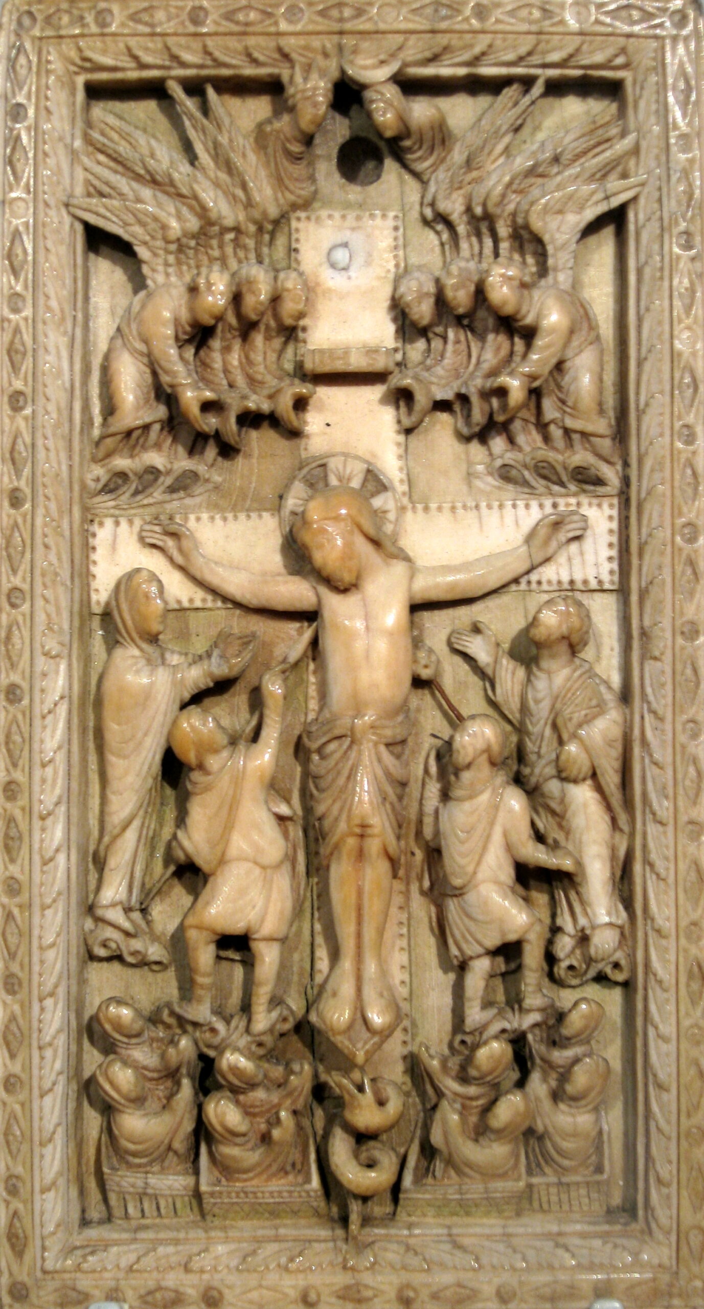 The Crucifixion, 860-70. Ivory panel from Reims, France. Victoria and Albert Museum