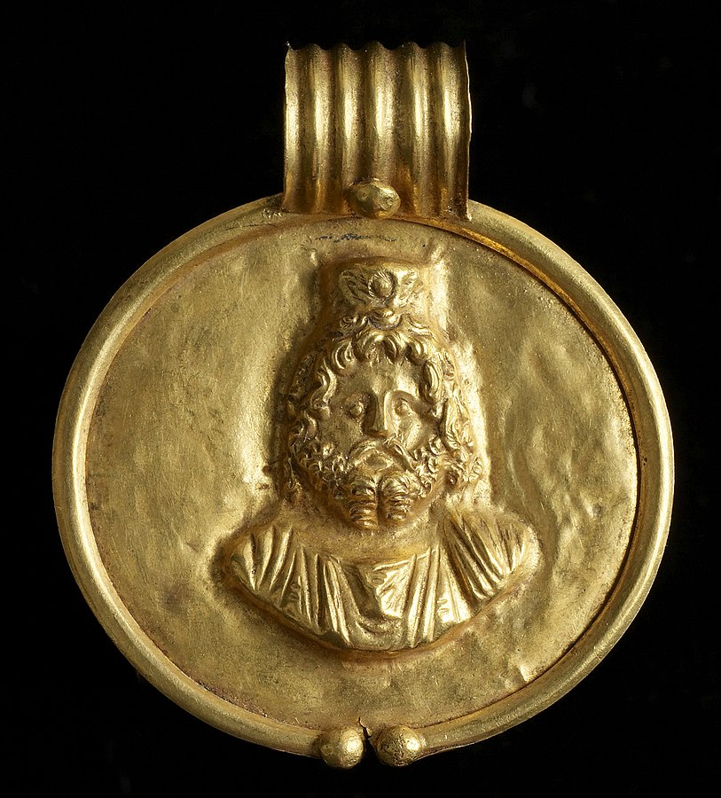 813px-Egyptian_-_Pendant_with_Image_of_Sarapis_-_Walters_571524_-_Front_View_B_(cropped)